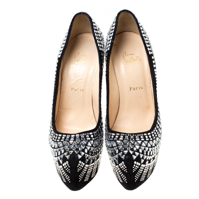One of the most coveted shoe designers, Christian Louboutin brings to you these Decora Strass pumps to make you look very stylish and absolutely stunning. These black pumps are crafted from suede and feature an almond-toe silhouette. They are