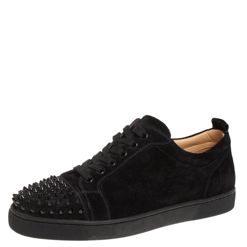We see the edgy aesthetic of Christian Louboutin well-translated on these sneakers. They are crafted from suede with spikes decorated on the cap toes. Lace-ups and leather insoles complete them. The red soles of the low-top sneakers will highlight