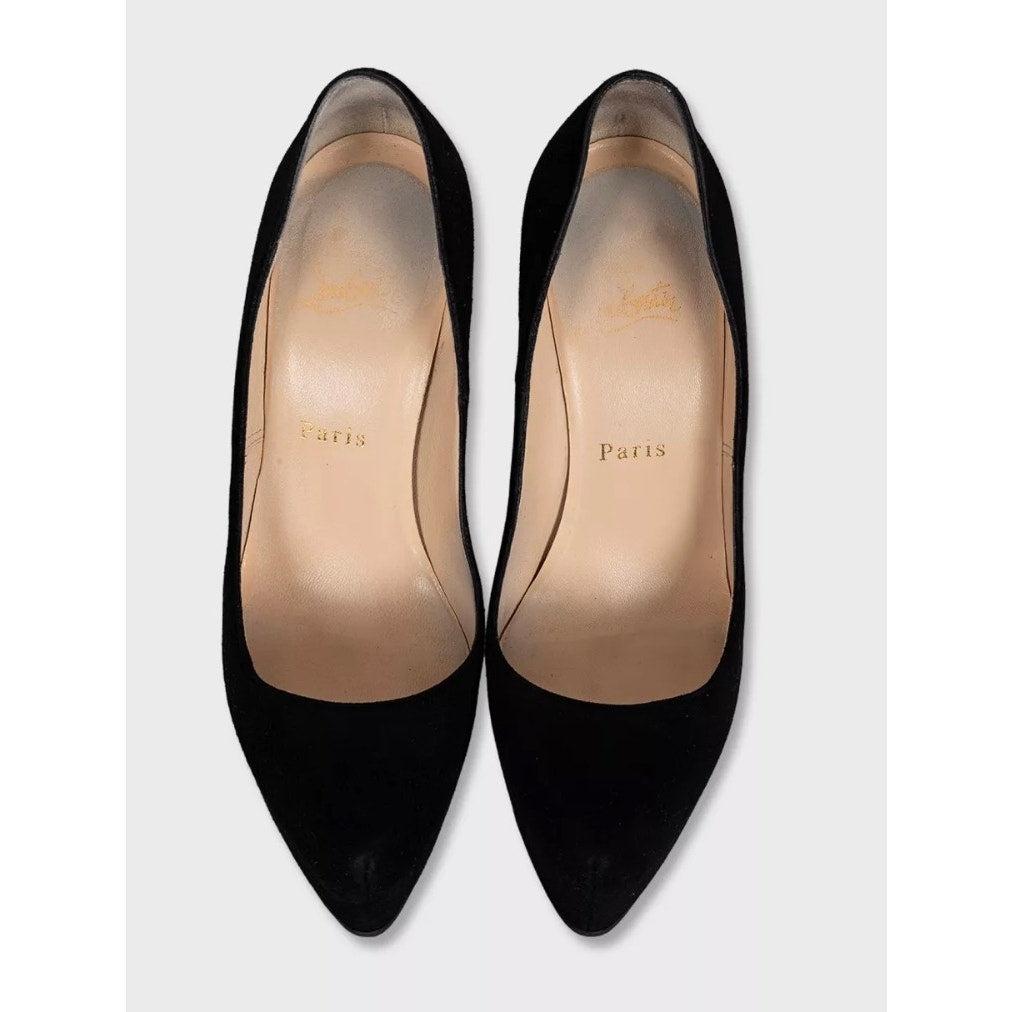 Elevate your style with these chic Christian Louboutin platform pumps. Crafted from luxurious black suede, these pumps feature an almond toe and a towering stiletto heel, perfect for making a statement. The leather insole ensures comfort, while the