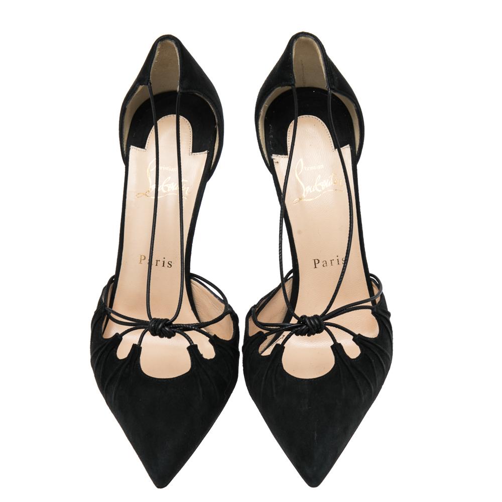 Who doesn't love statement shoes and especially when they're by Christain Louboutin! These Riri pumps come draped in rich suede and flaunt a classic black hue. They have cut-out details, leather strings, and stiletto heels. They'll leave you feeling