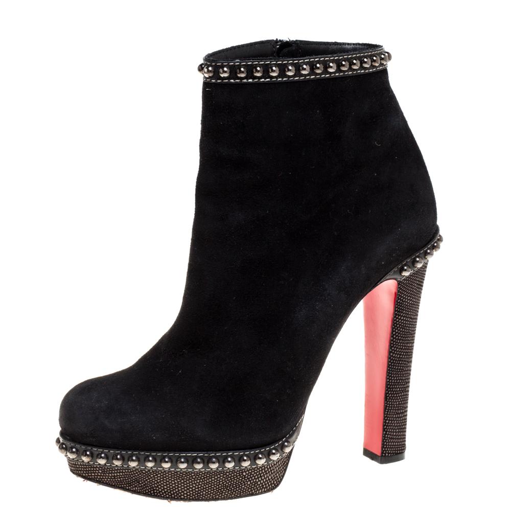 Built to last and add sophistication to your outfits, these boots from Christian Louboutin will definitely become your most favorite! They have been crafted from suede and detailed with black-tone studs that lend them a contemporary charm. They are