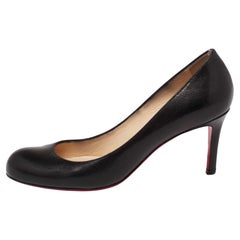 Christian Louboutin Schwarze einfache Pumps aus strukturiertem Leder Größe 37