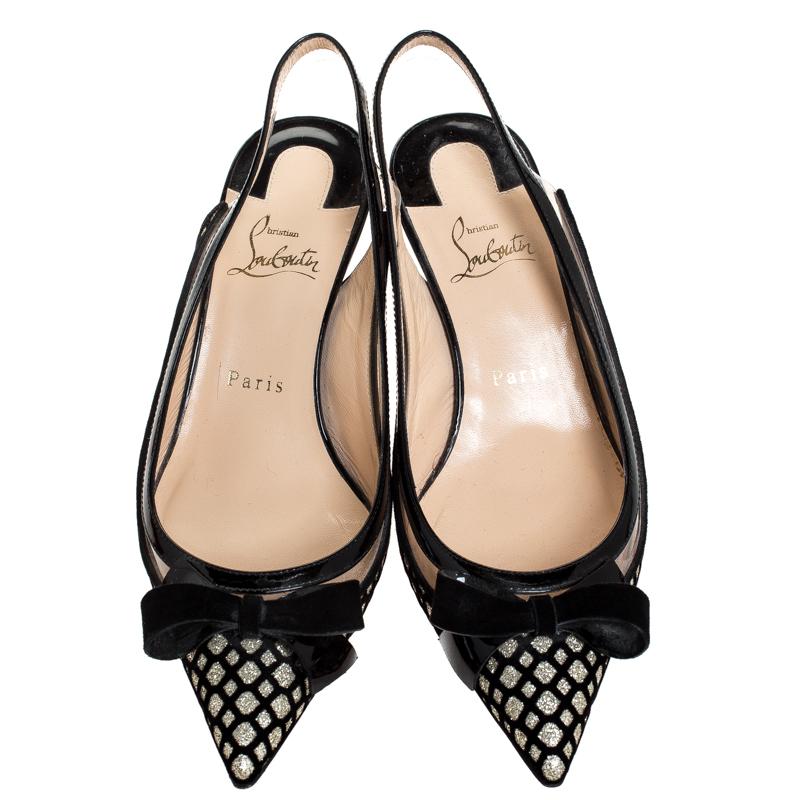 Create the most sophisticated and elegant looks with these Christian Louboutin slingback sandals. Designed in the chic and effortless combination of materials, these sandals are adorned with pointed toes, bows on the vamps and a low heel that will