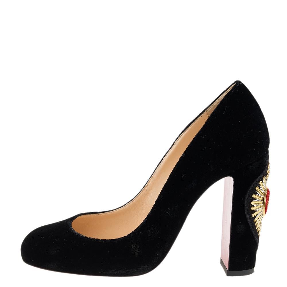 Christian Louboutin’s Cadrilla Corazon pumps are a great choice if you’re looking to add a pair that's both classy and bold. The pair has been made in Italy from black velvet and set on embellished block heels.