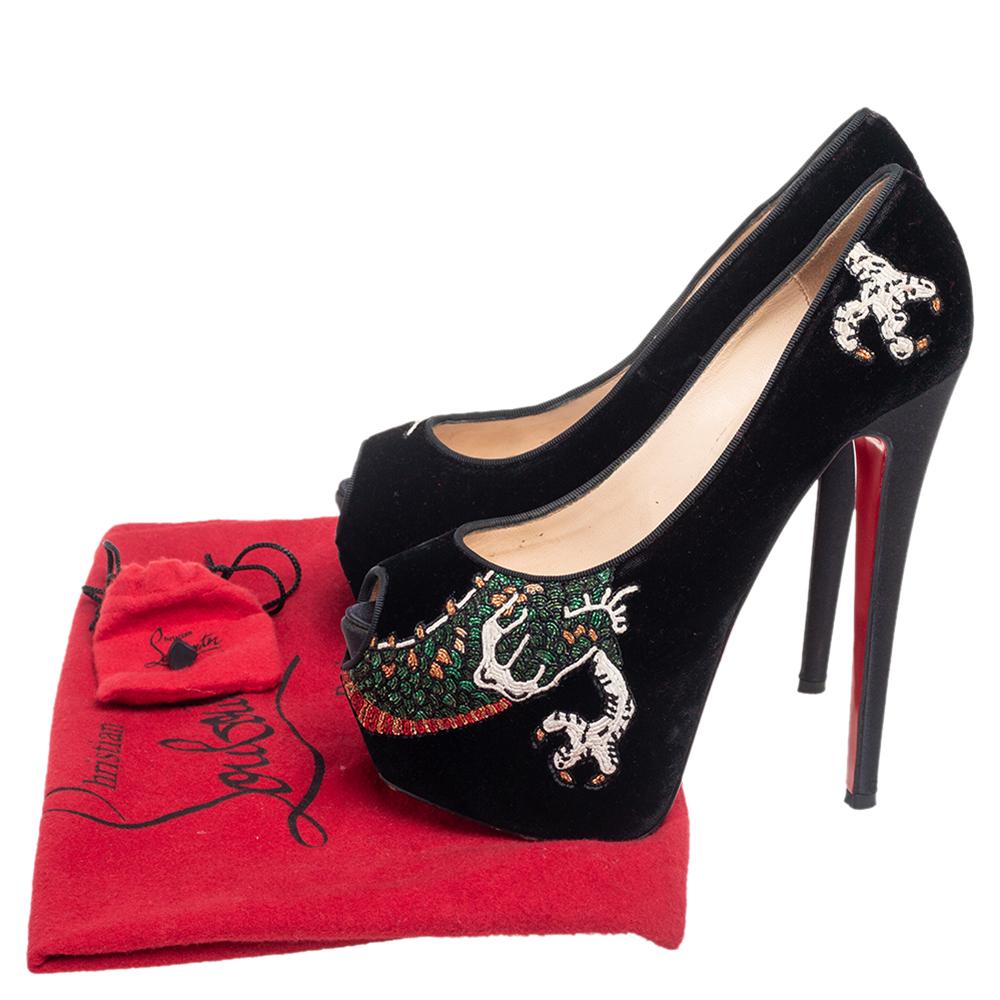 Strike a bold finish to your party outfit wearing these stunning Christian Louboutin Highness pumps. Crafted with black embroidered velvet, they feature an impressive peep-toe silhouette to count on. The leather-lined insoles carry brand labeling