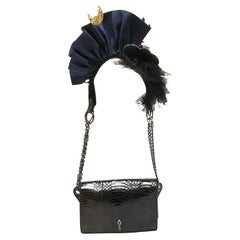 Christian Louboutin Borsa a tracolla in pelle nera impreziosita da una catena