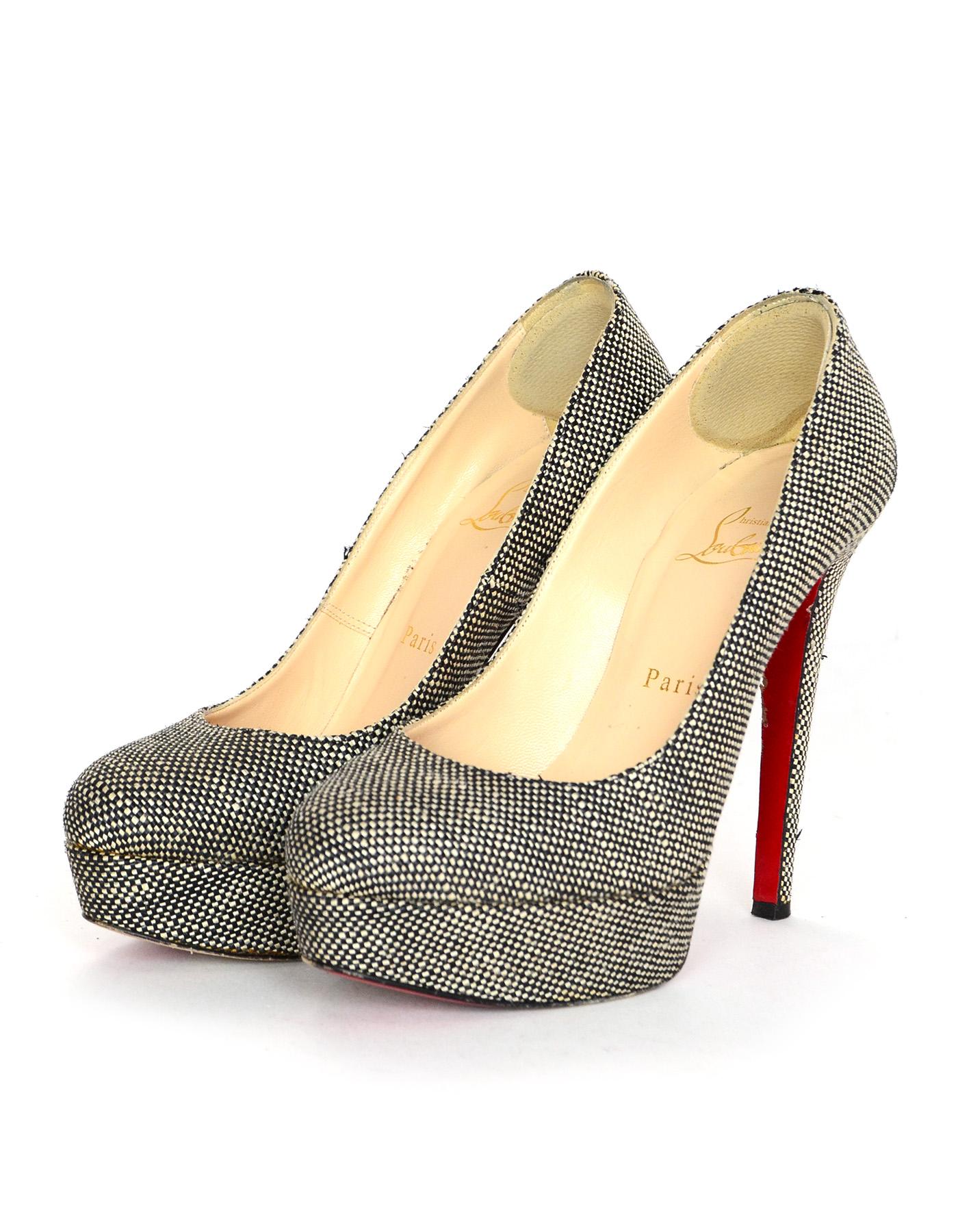 Christian Louboutin Black/White Tweed Bianca Platform Shoes Sz 37

Made In: Italy
Color: Black/white
Materials: Tweed
Closure/Opening: Slide on 
Overall Condition: Excellent pre-owned condition with exception of minor wear on back of heels and