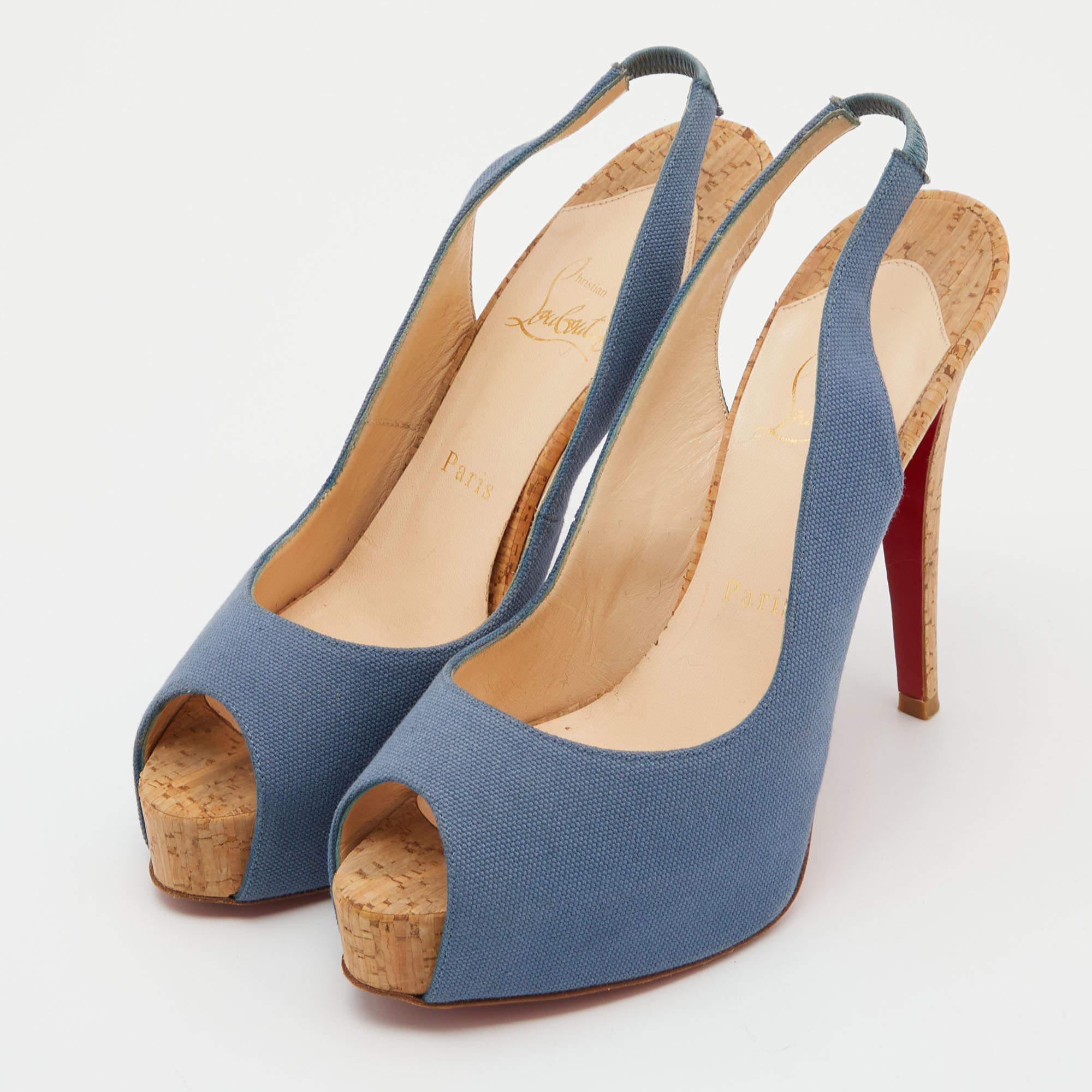 Stride through the day with confidence by adorning this pair of Christian Louboutin pumps. Created from canvas, its well-designed curves will elegantly outline your feet. The 12.5cm heels of these peep-toe shoes will take your fashion sense to new