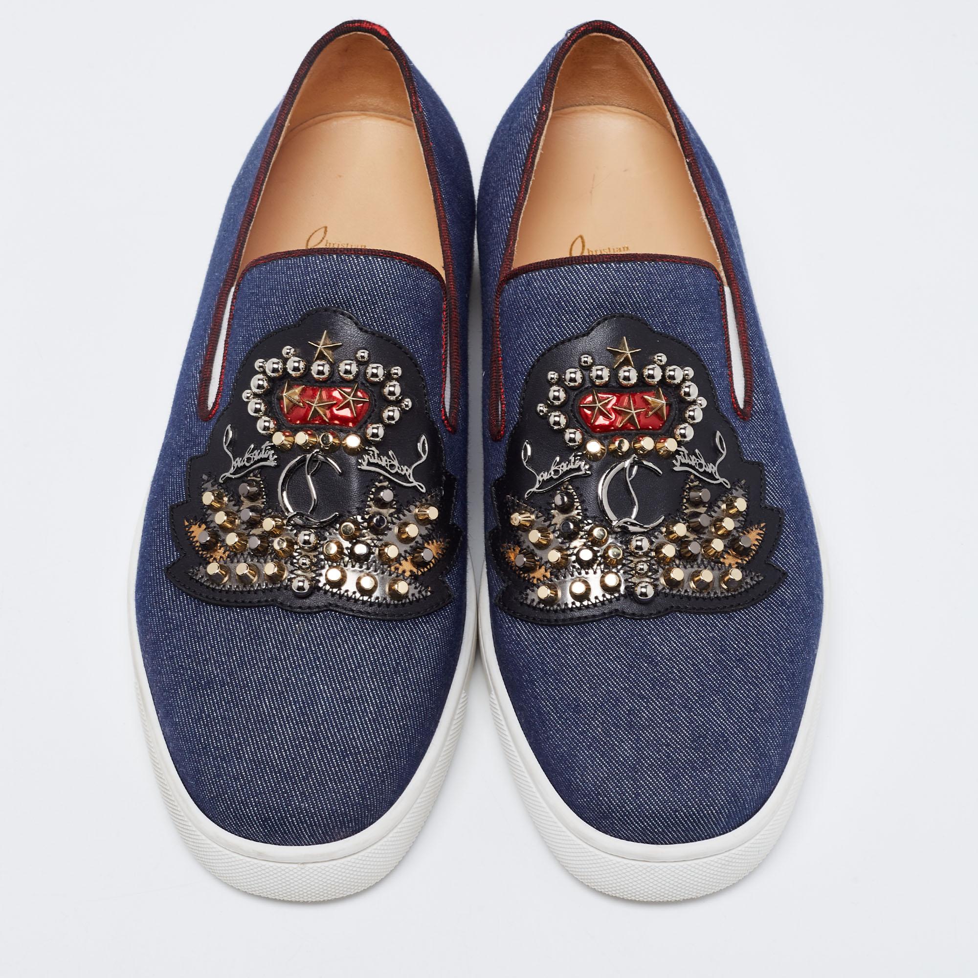 The embellishment on the uppers adds an extra edge to these Christian Louboutin sneakers. Created from denim, they are instantly recognizable with their signature red-lacquered soles and are functional with leather insoles.

