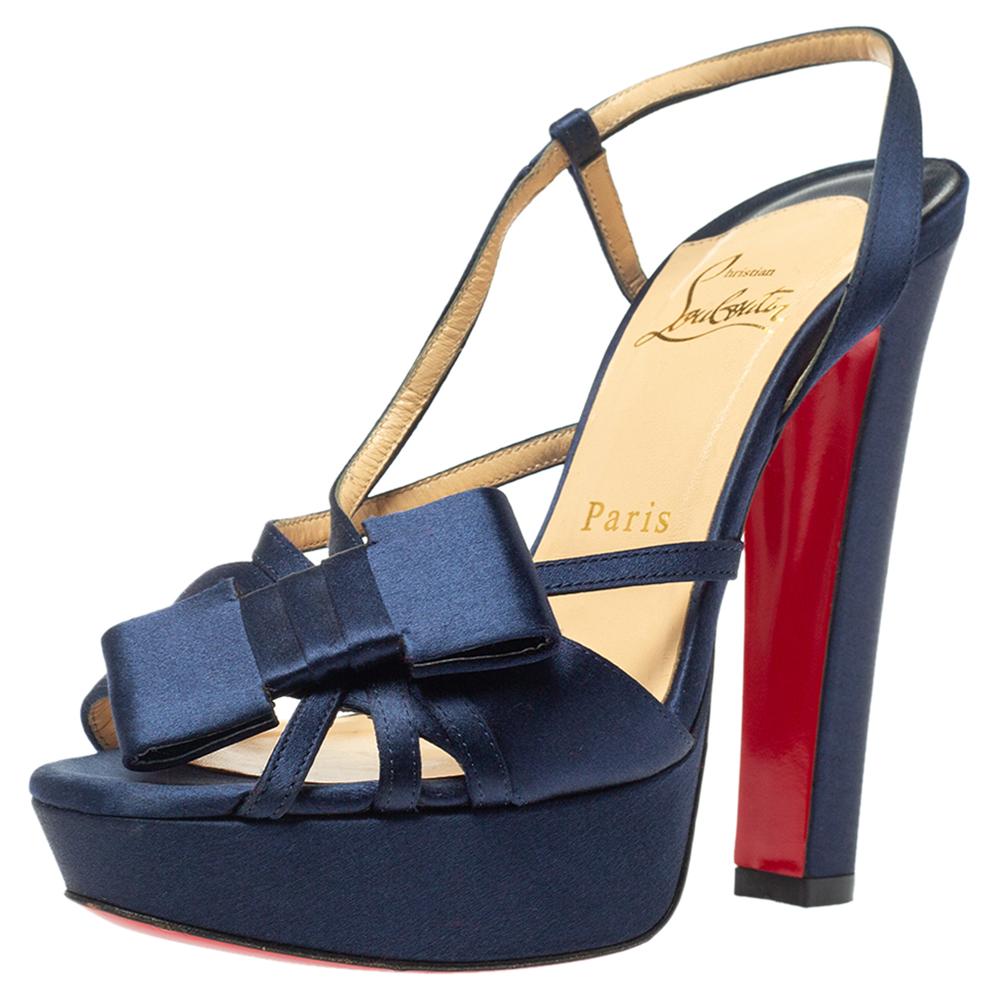 Wear these stylish sandals from the house of Christian Louboutin and channel your inner fashionista. These satin sandals will make you look confident and uber-stylish. Set on 14 cm heels and supported by platforms, these sandals feature bow