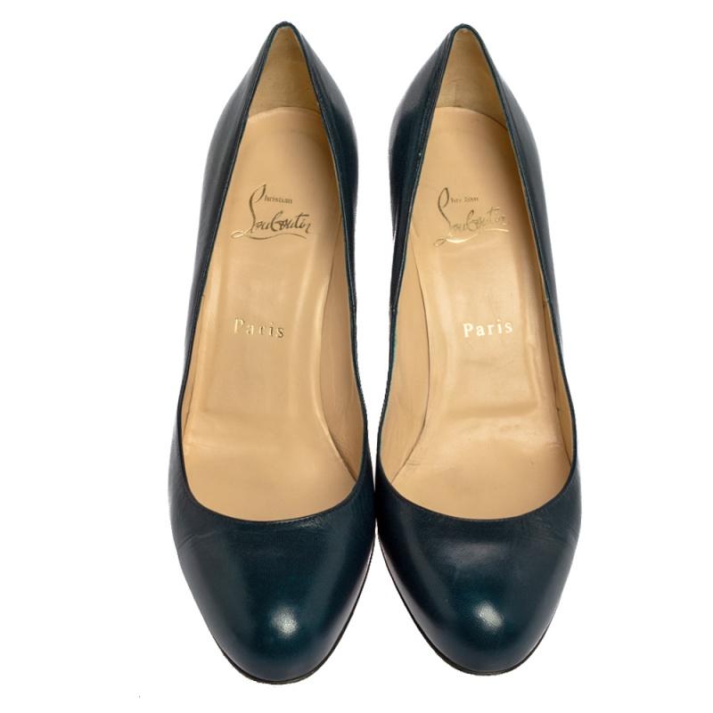Louboutins are designed to lift one's attitude and outfit. Let this pair lift yours as well by owning them today. Crafted from leather, these blue pumps carry covered toes and a sleek silhouette. Completed with 9 cm heels and the signature red