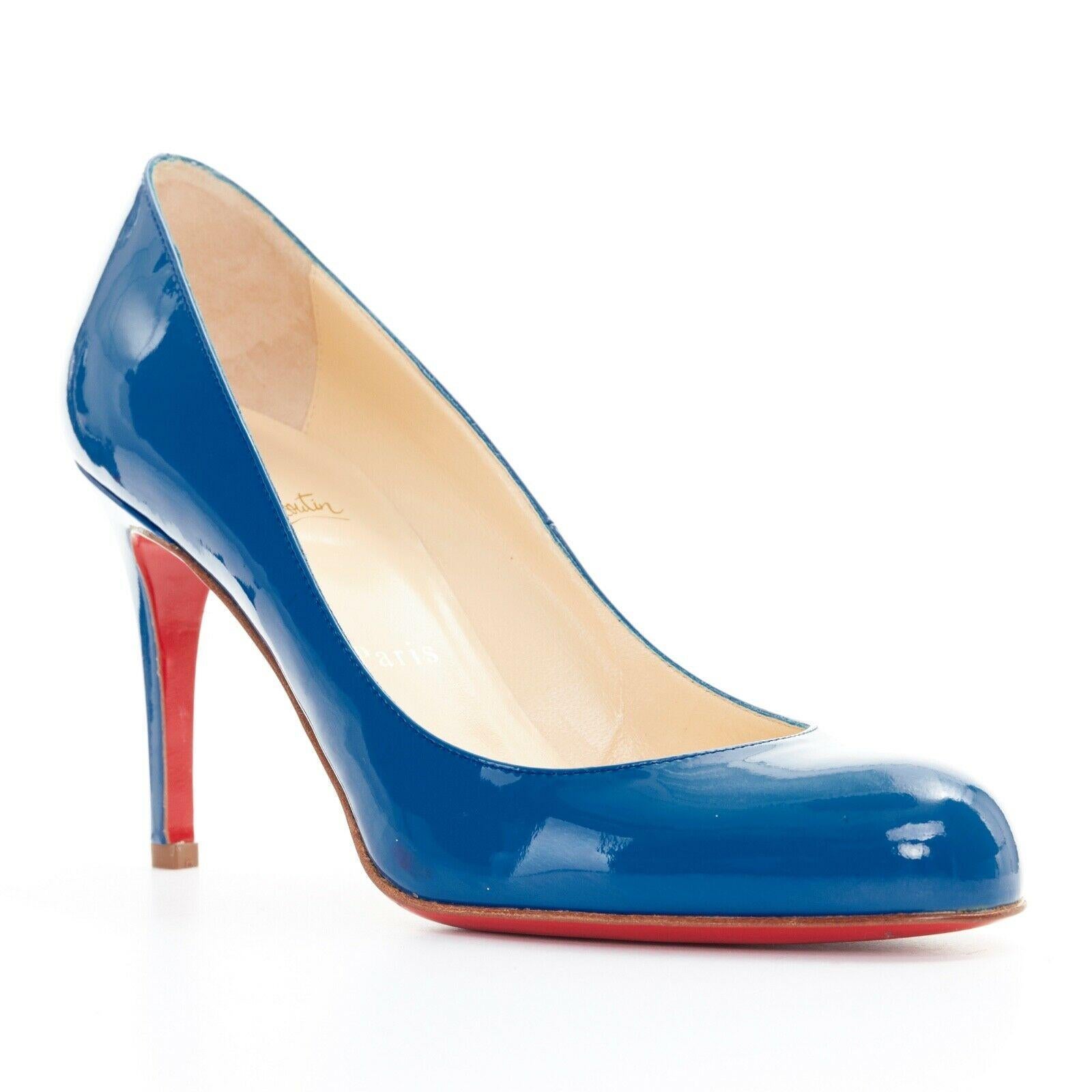 CHRISTIAN LOUBOUTIN blue patent leather almond round toe slim heel pump EU38
Brand: Christian Louboutin
Designer: Christian Louboutin
Model Name / Style: Patent pump
Material: Patent leather
Color: Blue
Pattern: Solid
Extra Detail: Almond round toe.