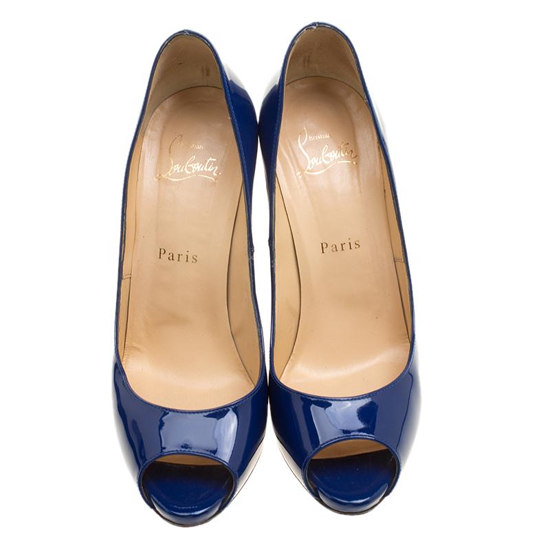 Crafted from patent leather that imparts a shiny glow to them, this pair of pumps from the house of Christian Louboutin have been designed to add a hint of luxurious panache to your everyday style. Featuring a chic blue shade these peep toe pumps