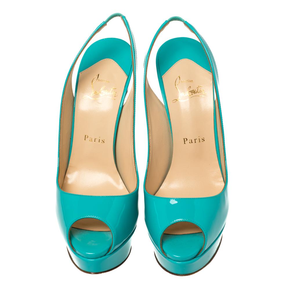 Stand out from a crowd with this gorgeous pair of Louboutins that exude high fashion with class! Crafted from patent leather, this is a creation from their Lady Peep collection. They feature a classic blue shade with peep toes, slingbacks and a