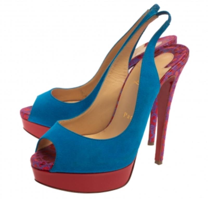 Add vibrancy to your shoe collection with these gorgeous Louboutin sandals that exude high fashion and class! Crafted from suede and fabric, they belong to the label's Lady Peep collection. The creation features blue and red shades in a peep-toe