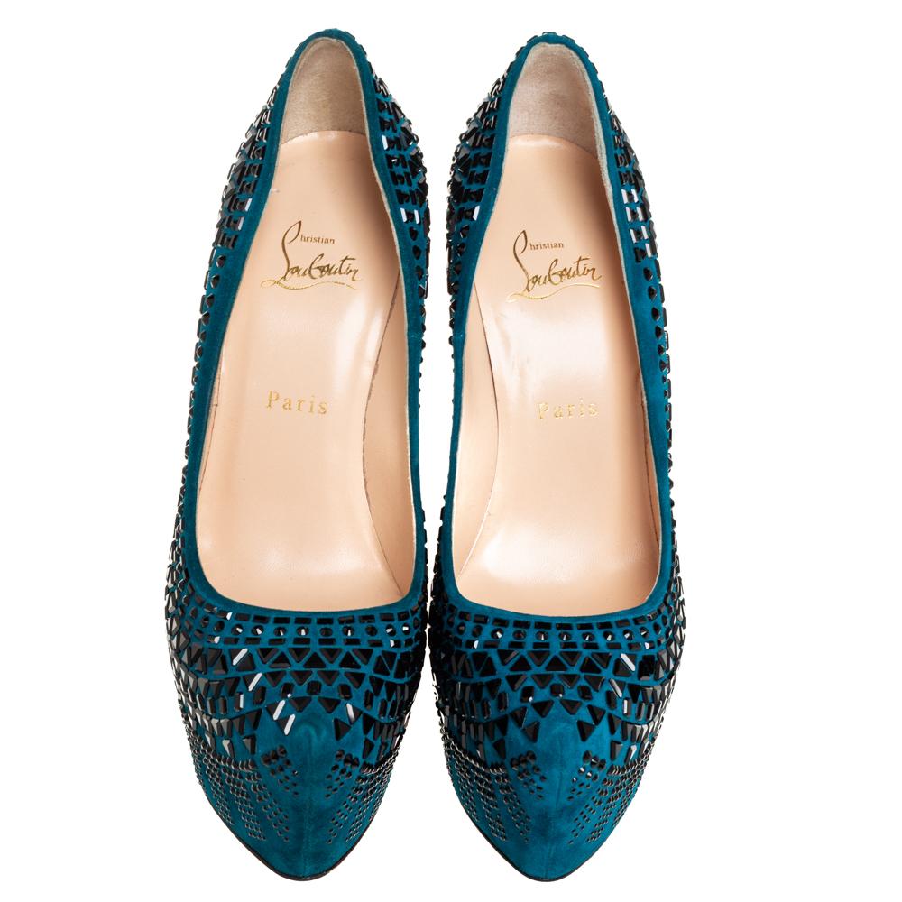 Make the streets your fashion runway in these gorgeous pumps from Christian Louboutin! These blue pumps are crafted from suede and feature a pointed toe silhouette. They flaunt embellishments all over the exterior and come equipped with comfortable