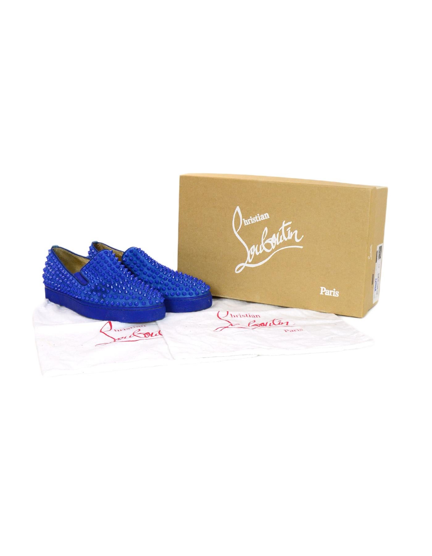 Christian Louboutin Blue Suede Roller Boat Spiked Slip-On Sneakers Sz 41

Made In: EU
Color: Blue
Materials: Suede, metal
Closure/Opening: Slide on
Overall Condition: Good pre-owned condition with exception of stain on the right shoe and some wear