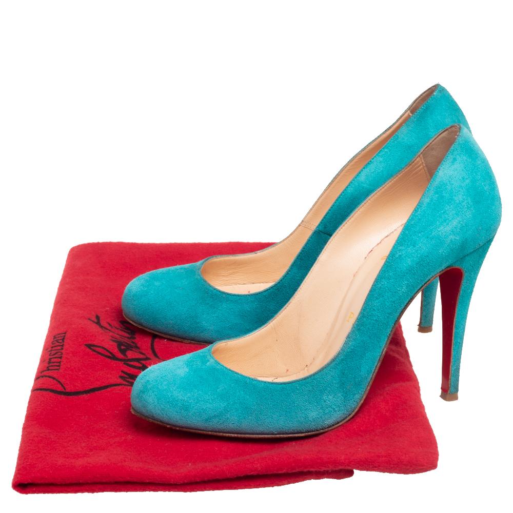 Louboutins are designed to lift one's attitude and outfit. Let this pair lift yours as well by owning them today. Crafted from suede, these blue pumps carry covered toes and a sleek silhouette. Completed with 10 cm heels and the signature red soles,