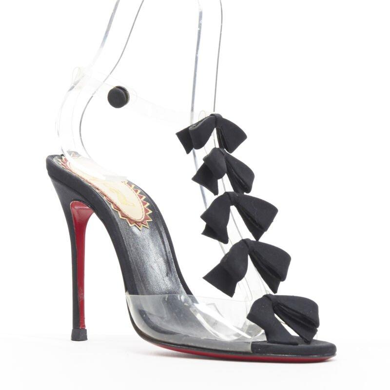 CHRISTIAN LOUBOUTIN Chaussures à talons compensés en PVC avec nœud et ruban gros-grain noir EU36
Référence : TGAS/A05769
Marque : Christian Louboutin
Modèle : Bow Bow
Matériau : PVC
Couleur : Noir
Motif : Solide
Fermeture : Bracelet de