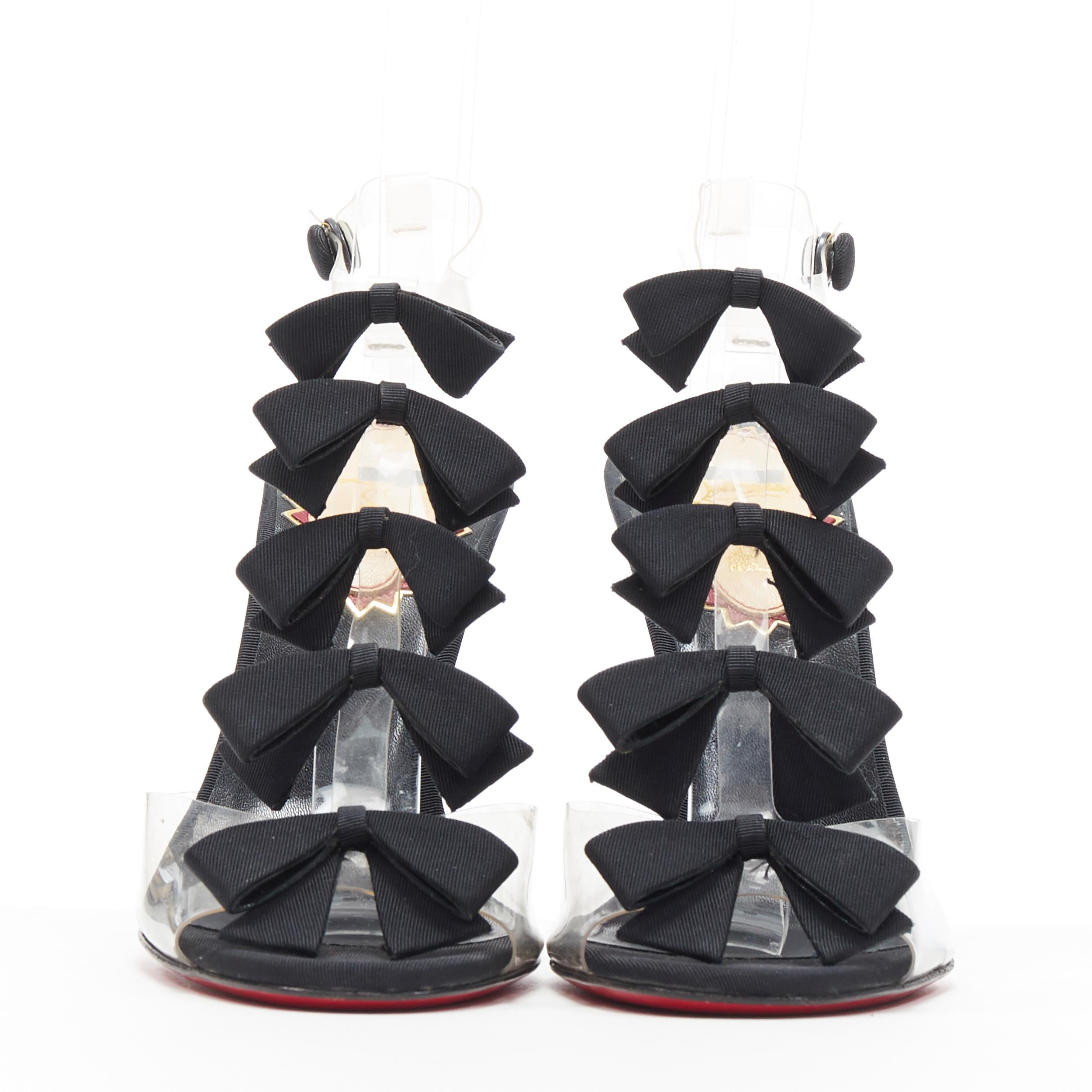 Nero CHRISTIAN LOUBOUTIN Bow Bow nero con nastro in gros grain e cinturino in PVC con tacco EU36