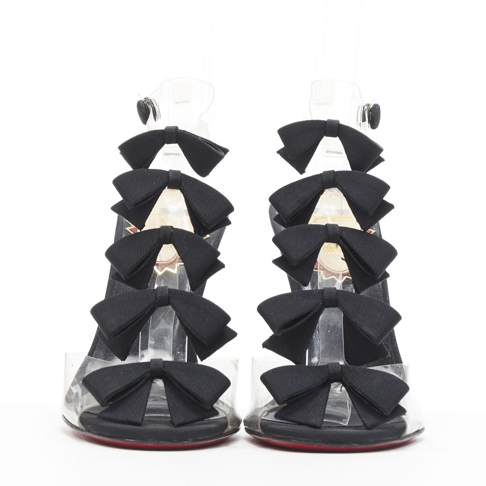 Black CHRISTIAN LOUBOUTIN Bow Bow black grosgrain ribbon PVC t-strap sandal heels EU36 For Sale