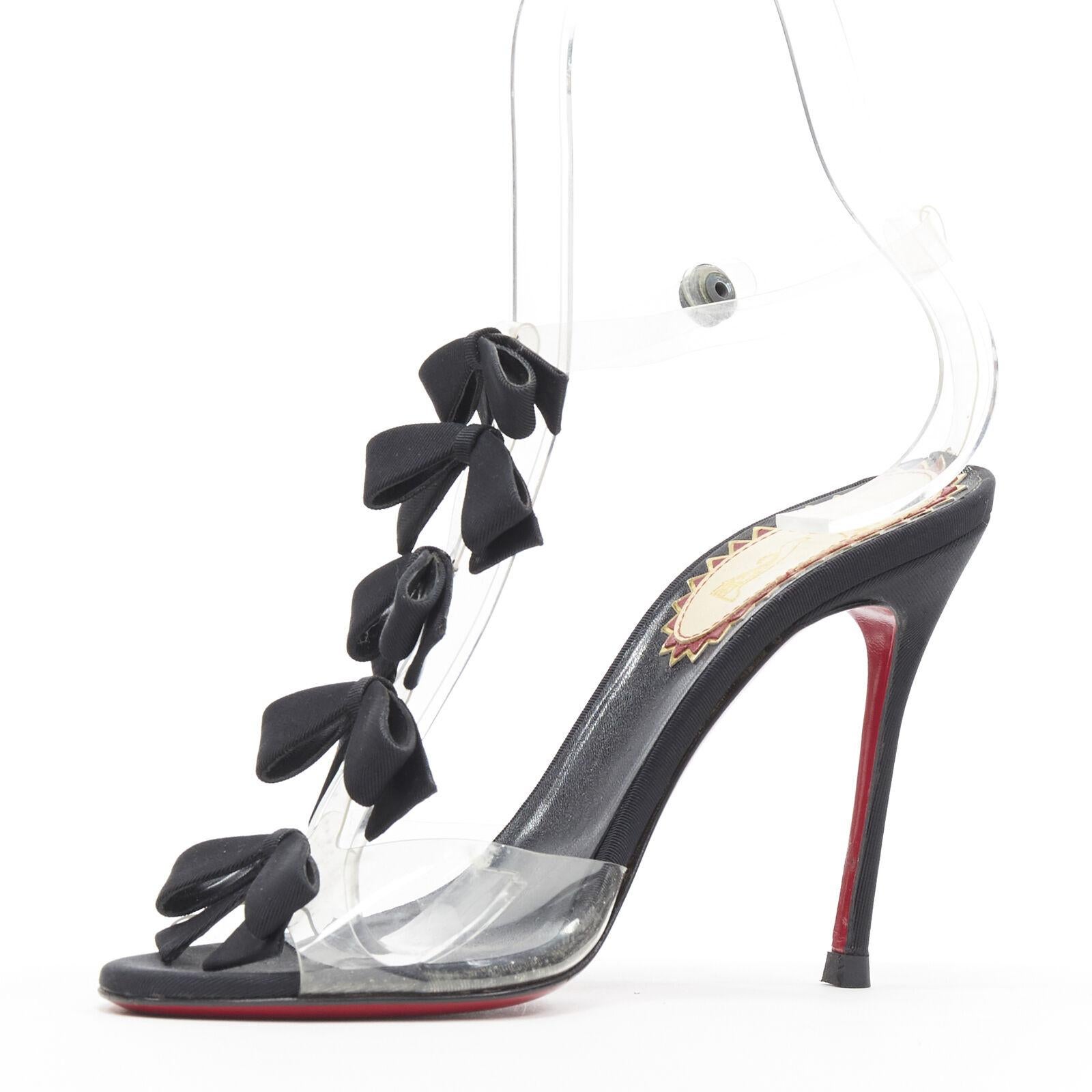 CHRISTIAN LOUBOUTIN Bow Bow black grosgrain ribbon PVC t-strap sandal heels EU36 In Good Condition For Sale In Hong Kong, NT