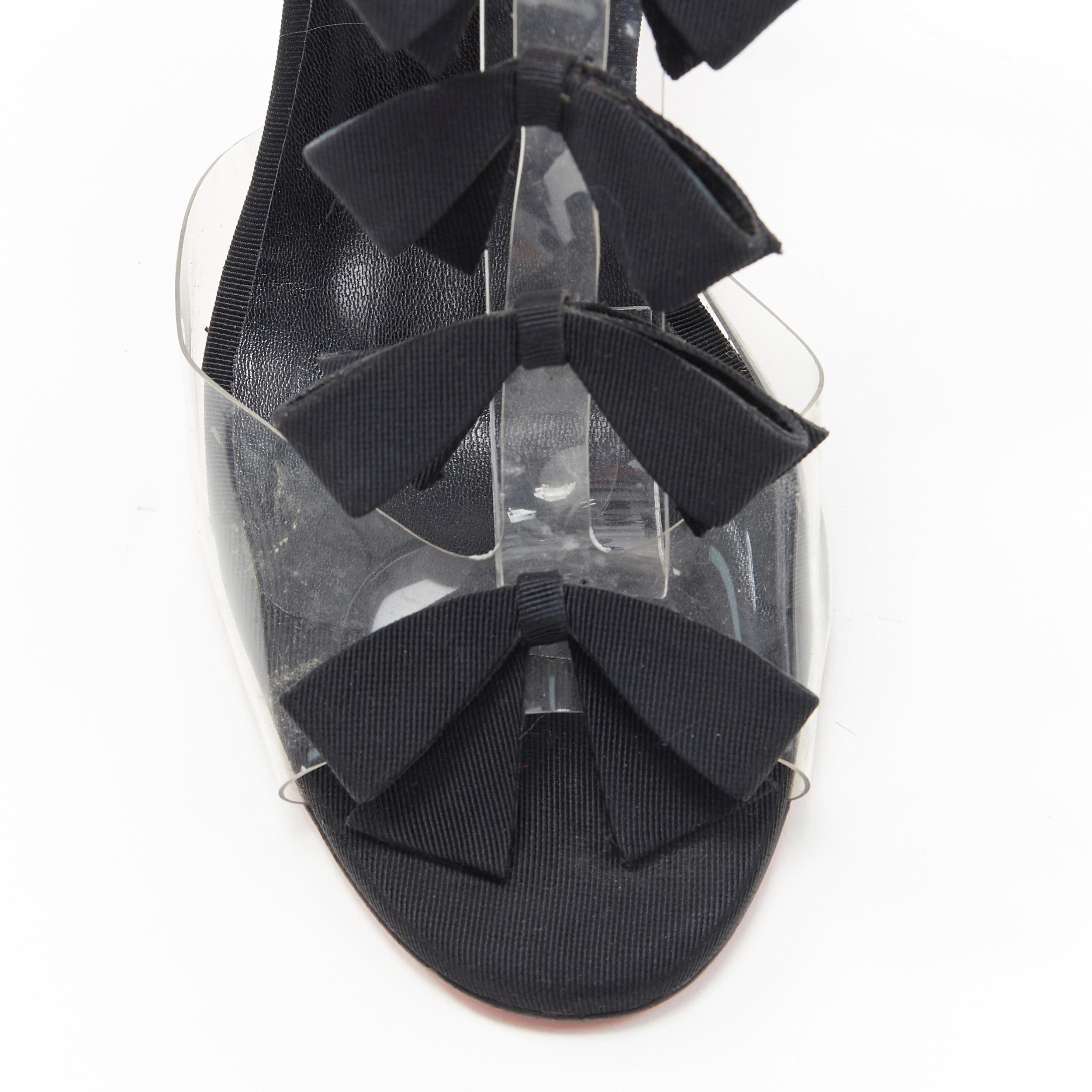 CHRISTIAN LOUBOUTIN Bow Bow nero con nastro in gros grain e cinturino in PVC con tacco EU36 3