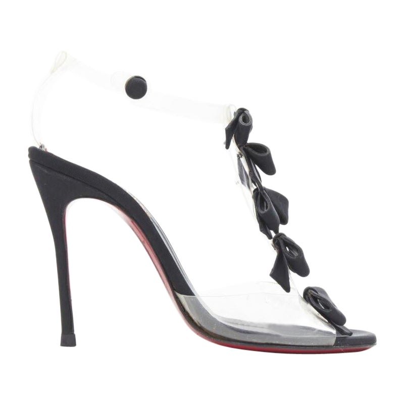 CHRISTIAN LOUBOUTIN Bow Bow nero con nastro in gros grain e cinturino in PVC con tacco EU36