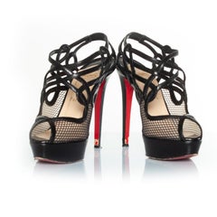 Christian Louboutin, Branda slingback fishnet heels.