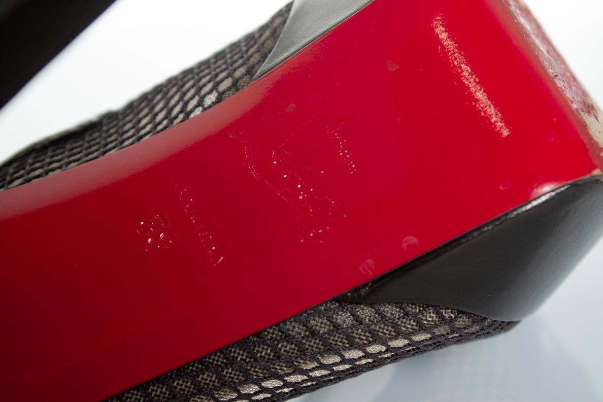 Christian Louboutin, Branda slingback fishnet heels. 2