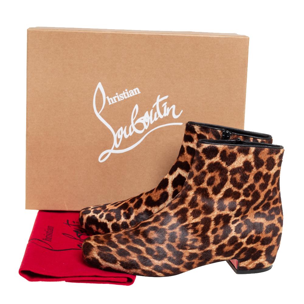Christian Louboutin impresses us with these fabulous Tounoir ankle boots that come crafted from leopard-printed calf hair in a round toe silhouette. They are styled with side zippers, low block heels, and signature red-lacquered soles.

Includes: