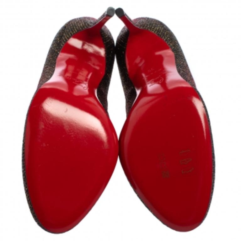 A shoe collection is incomplete without a pair of dazzling pumps. These Christian Louboutin beauties have been created from glitter fabric and styled with round toes, and 10 cm heels. The pumps carry leather-lined insoles and the signature red soles.