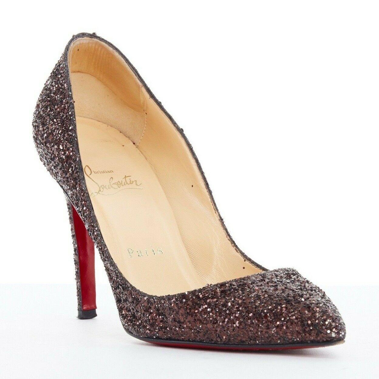 CHRISTIAN LOUBOUTIN brown glitter point toe pigalle pump heels EU37
CHRISTIAN LOUBOUTIN
Course glitter covered leather upper. Point toe. 
Covered stiletto heel. Tan leather lining and sole. 
Signature red leather outsole. 
Made in