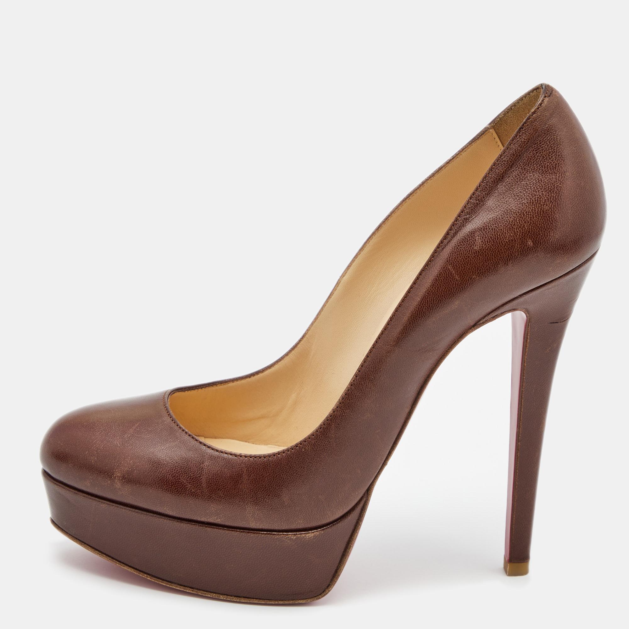Embrace new styles and trends as you wear these Bianca pumps from the House of Christian Louboutin. They are made from brown leather on the exterior, granting them an exceptionally glamorous look. These pumps show platforms, rounded toes, and pointy