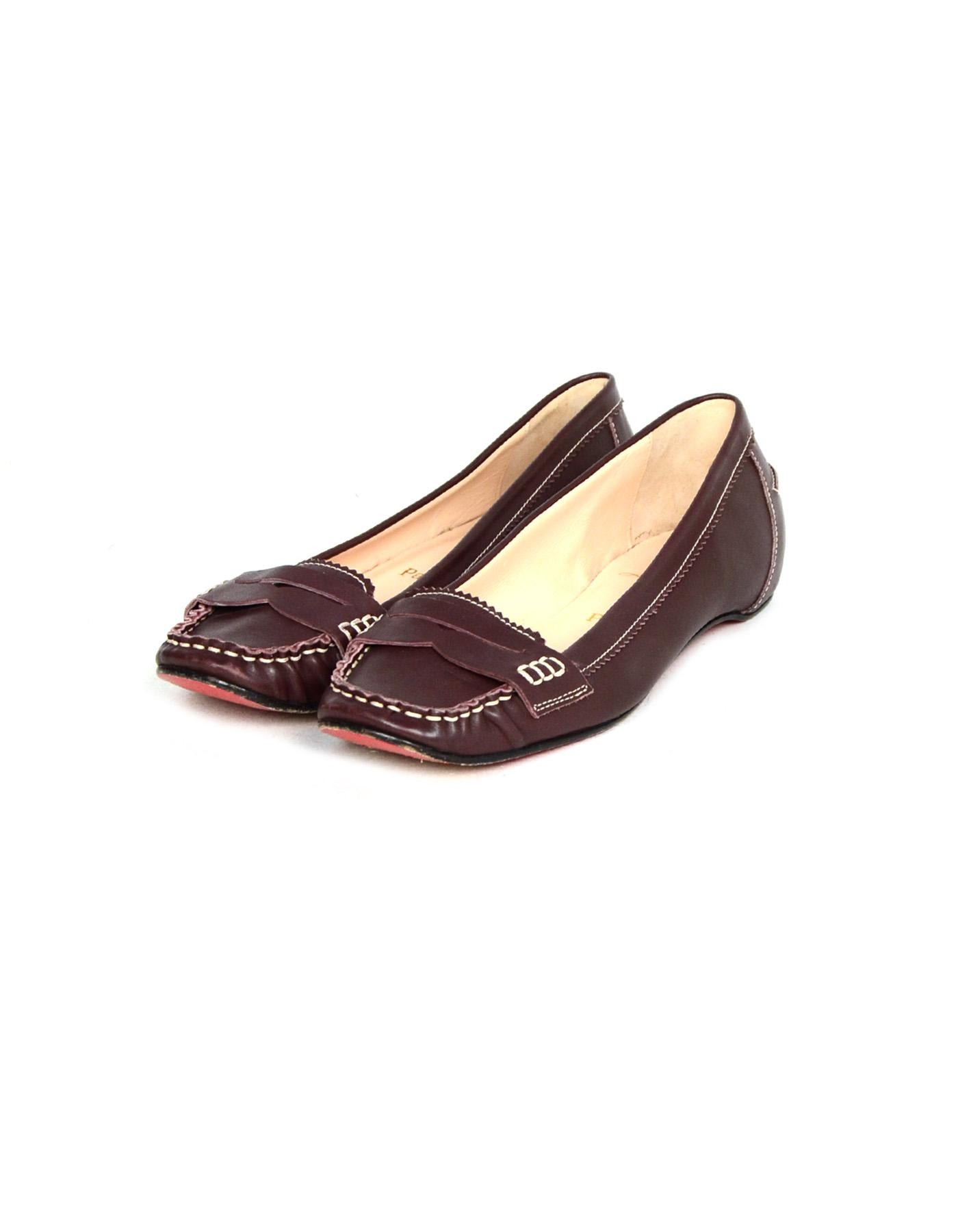 Christian Louboutin Brown Leather Loafers Sz 38

Made In: Italy
Color: Brown
Materials: Leather
Closure/Opening: Slide on
Overall Condition: Very good pre-owned condition with exception of some scuffing on back of heels and bottom of toes.

Marked
