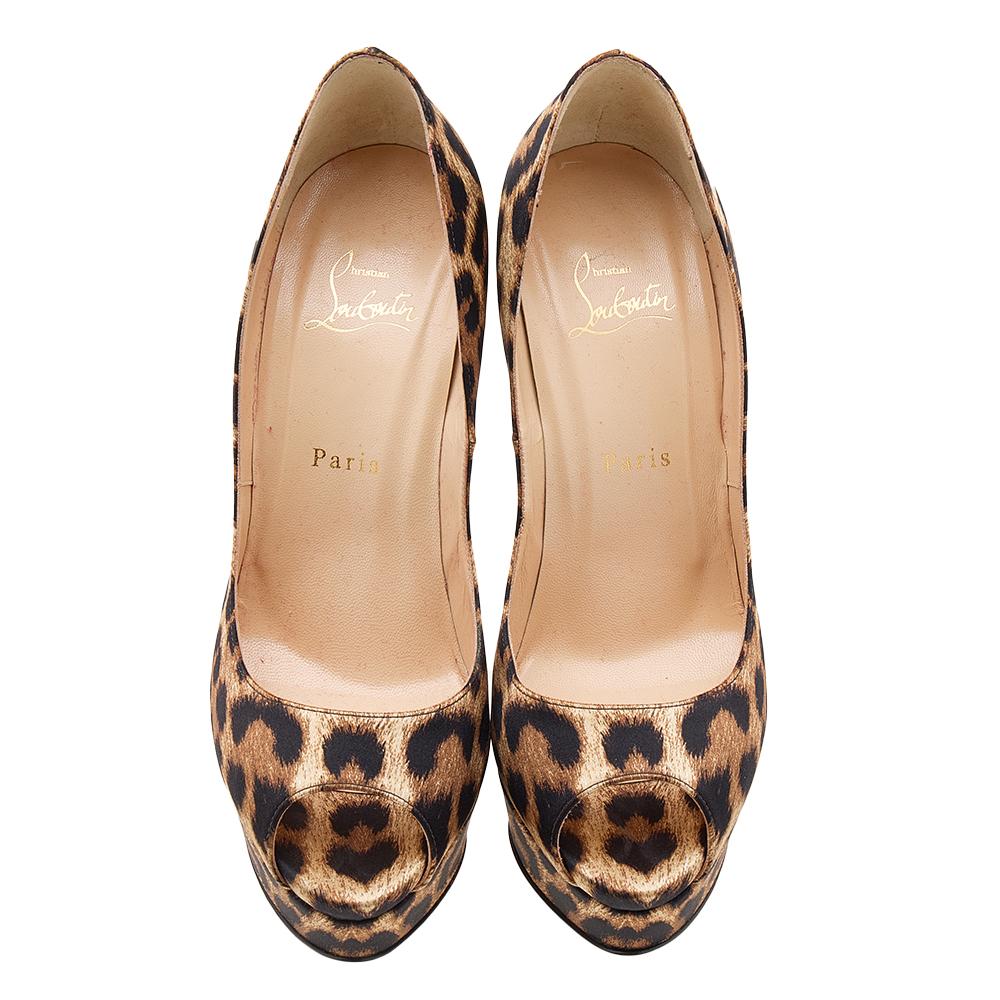 You will always be style-ready when you flaunt these pumps from Christian Louboutin. They have been crafted from leopard-printed satin in a peep-toe shape. Platforms and high stiletto heels complete this pair.

Includes: Original Dustbag