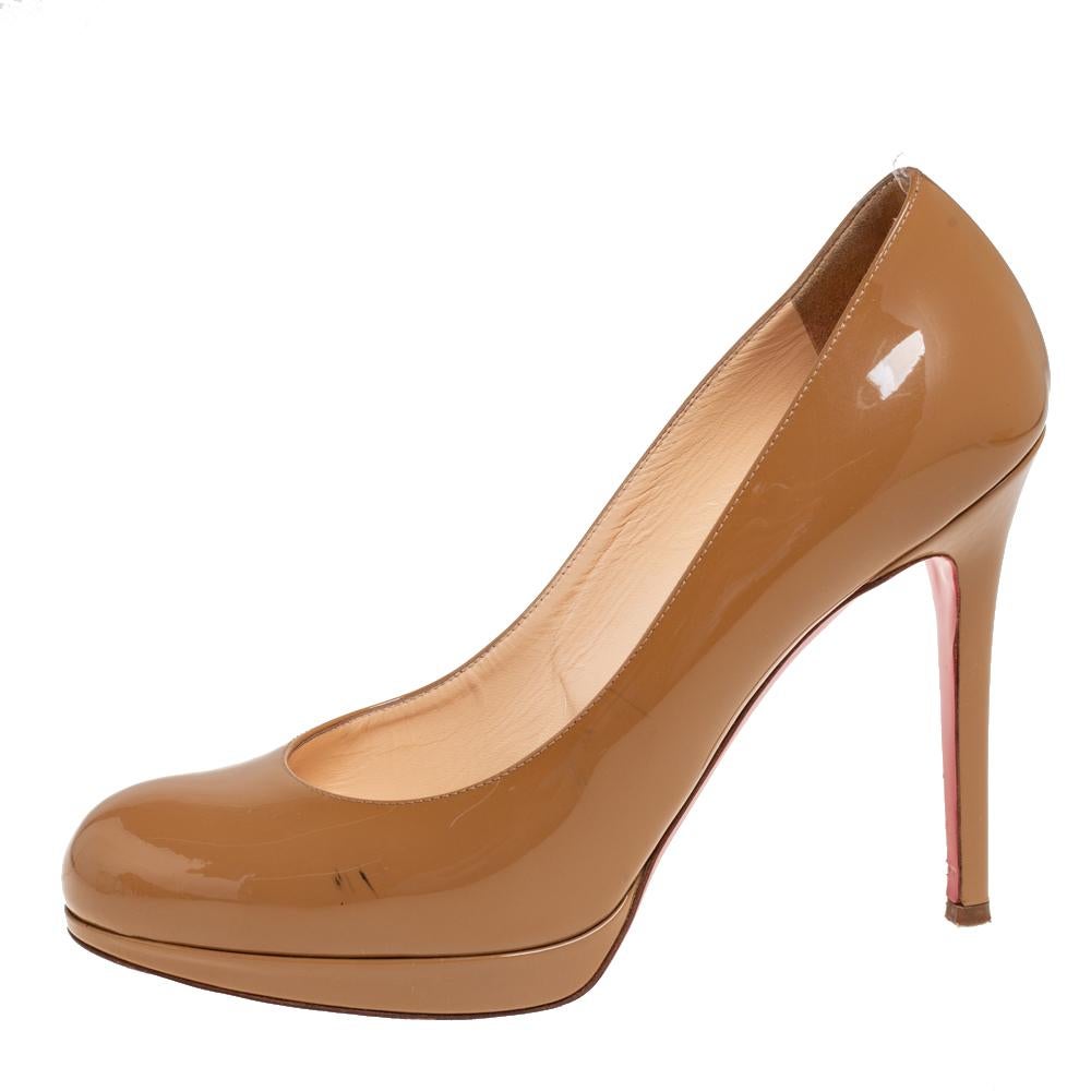 Louboutins are designed to lift one's attitude and outfit. Let this pair lift yours as well by owning them today. Crafted from patent leather, these brown pumps carry covered toes and a sleek silhouette. Completed with 11 cm heels and the signature