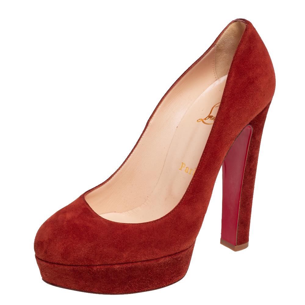 These Christian Louboutin Bibi platform pumps bring a classic shape with a gorgeous shade of brown. The pair features a soft suede exterior, round toes, platforms, and 14cm heels.

Includes: Original Dustbag