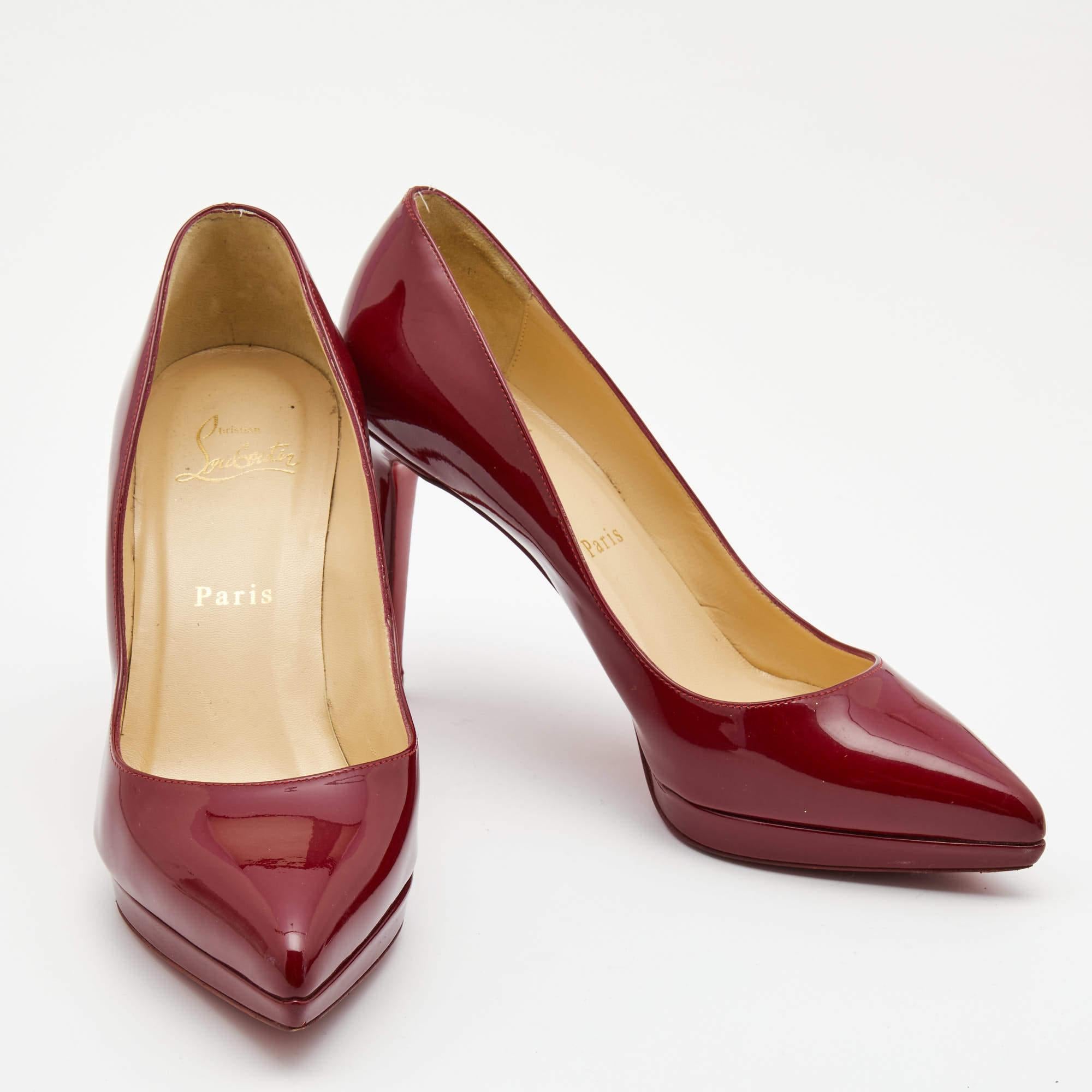 The classic pointed toes and signature red-lacquered sole characterize this pair of Christian Louboutin pumps. Crafted from patent leather, it has been styled with a burgundy exterior and a leather insole. The sleek heels and durable construction