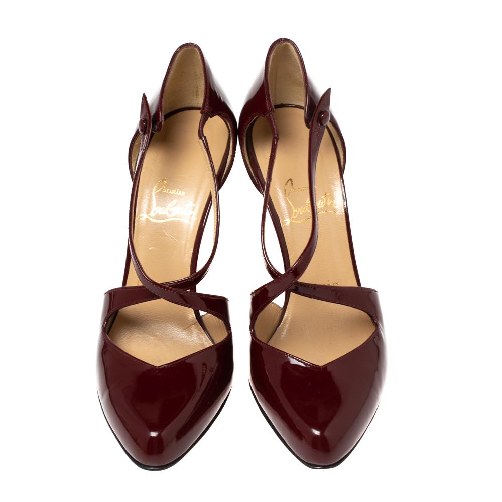 There are some shoes that stand the test of time and fashion cycles, these timeless Christian Louboutin pumps are the one. Crafted from patent leather in a burgundy shade, they are designed with sleek cuts, almond-toes, and tall heels.

