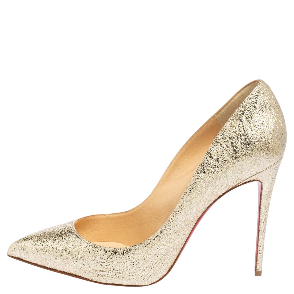 Dazzle everyone with these Louboutins by owning them today. Crafted from crinkled leather, these metallic gold Pigalle Follies pumps carry a mesmerizing shape with pointed toes and stiletto heels. Complete with the signature red soles, this pair