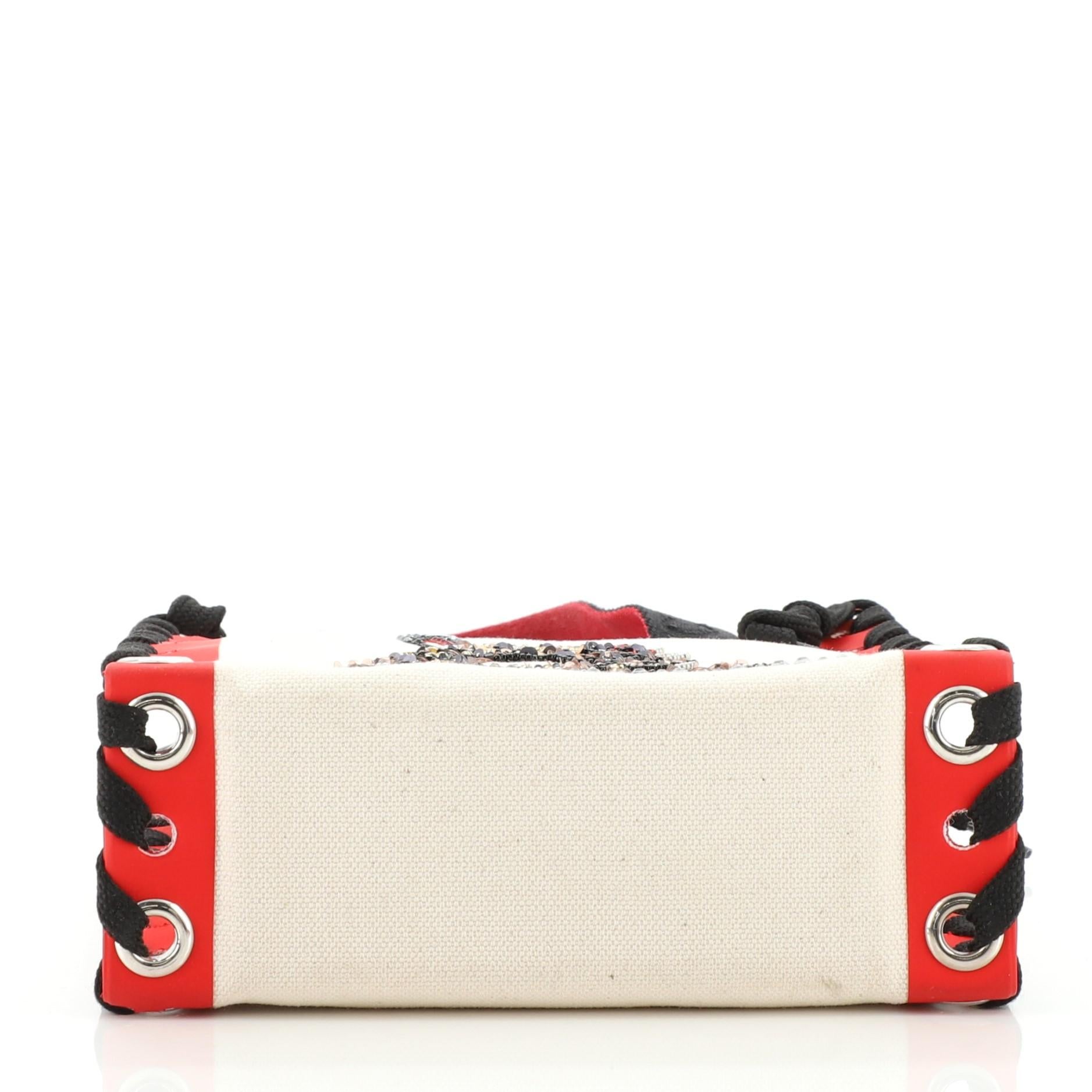 Christian Louboutin Cabalace-Tasche aus bedrucktem Segeltuch mit Leder Mini im Zustand „Gut“ in NY, NY