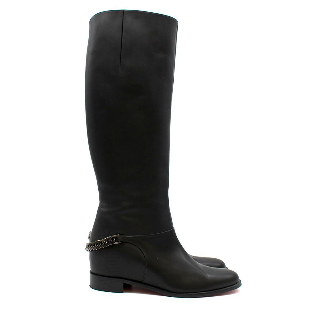 Christian Louboutin riding boots crafted in Italy from smooth black leather. Feature a silver chain trim, round-toe and a signature red leather sole. 

- Partially concealed wedge heel
-  Pull-on
- Made in Italy

Heel height: 2.5cm
Insole: