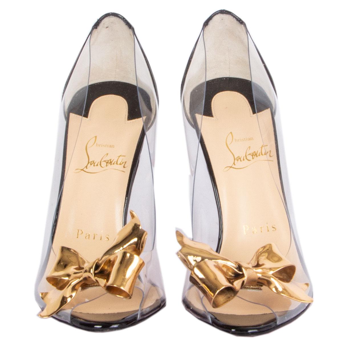 100% authentic Christian Louboutin Justinodo open-toe pumps in clear pvc and black patent leather featuring gold-tone metal bow embellishment. Brand new. 

Imprinted Size 36.5
Shoe Size 36.5
Inside Sole 23cm (9in)
Width 7cm (2.7in)
Heel 10cm
