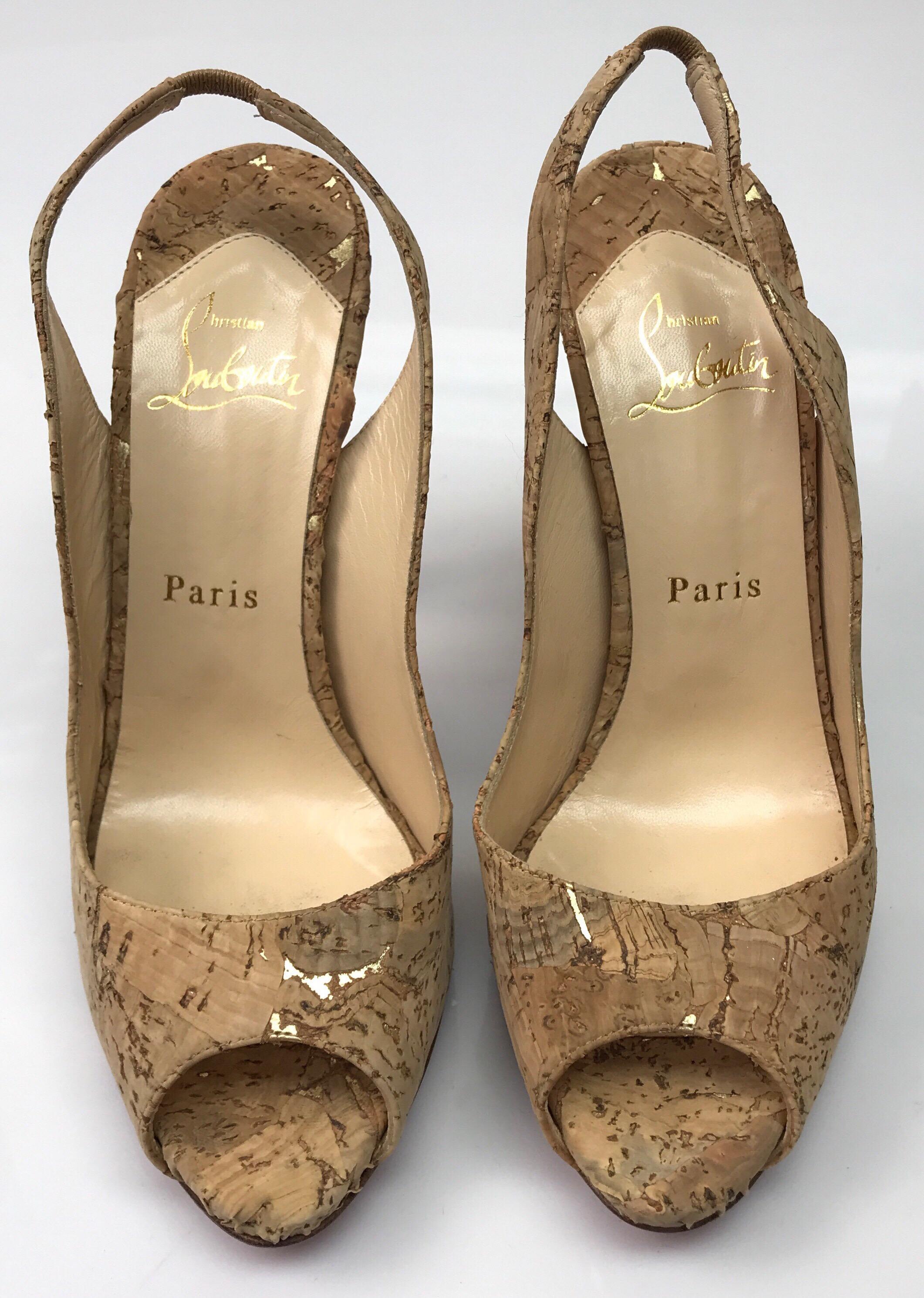 CHRISTIAN LOUBOUTIN Cork Slingback pumps- 37.5. These beautiful Christian Louboutin pumps are in excellent condition. They show minimal sign of wear, including some staining on the inside of the shoe.  The heel is made of cork material and has a