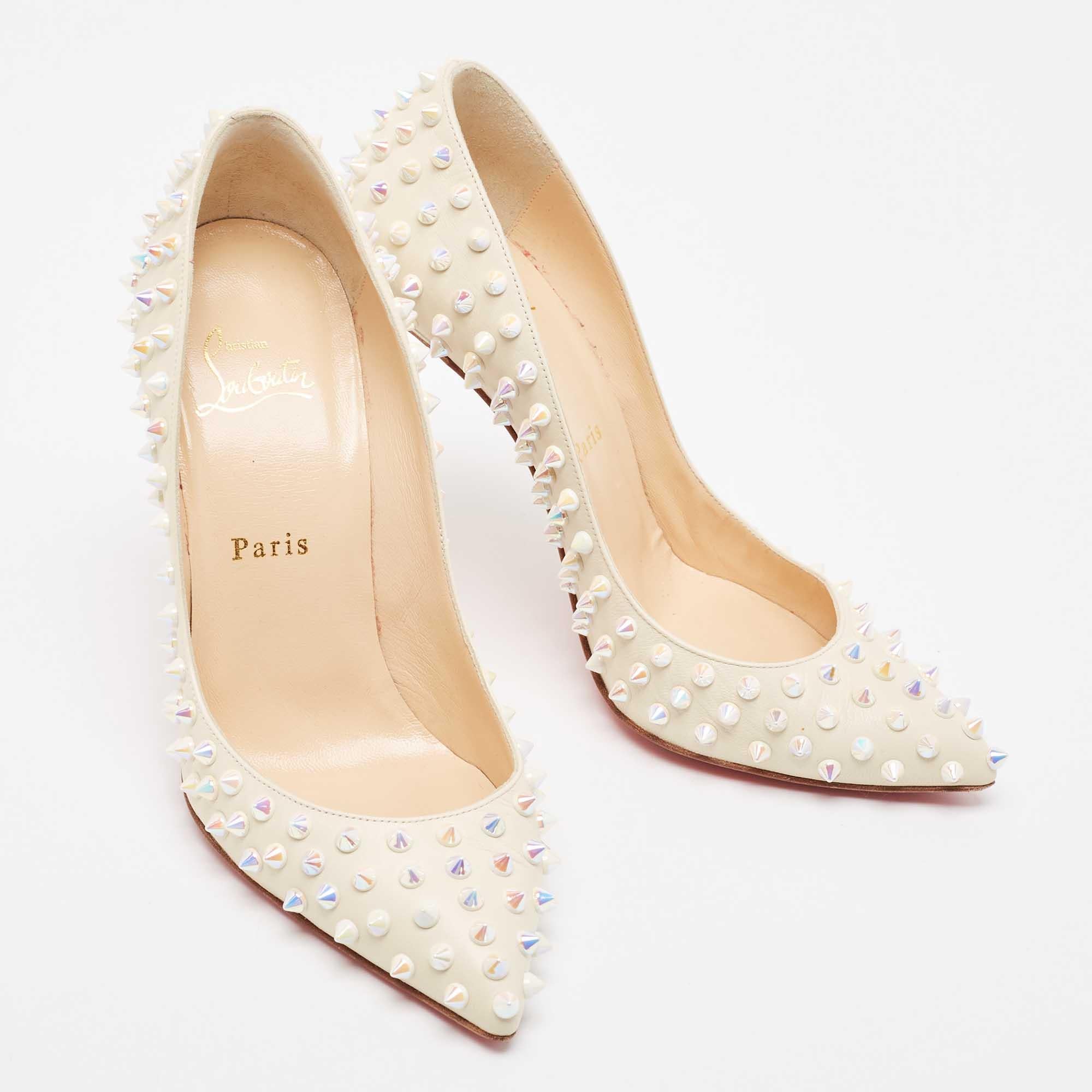 Beige Christian Louboutin Cream Leather Follies Spikes Pointed Toe Pumps Size 38 For Sale