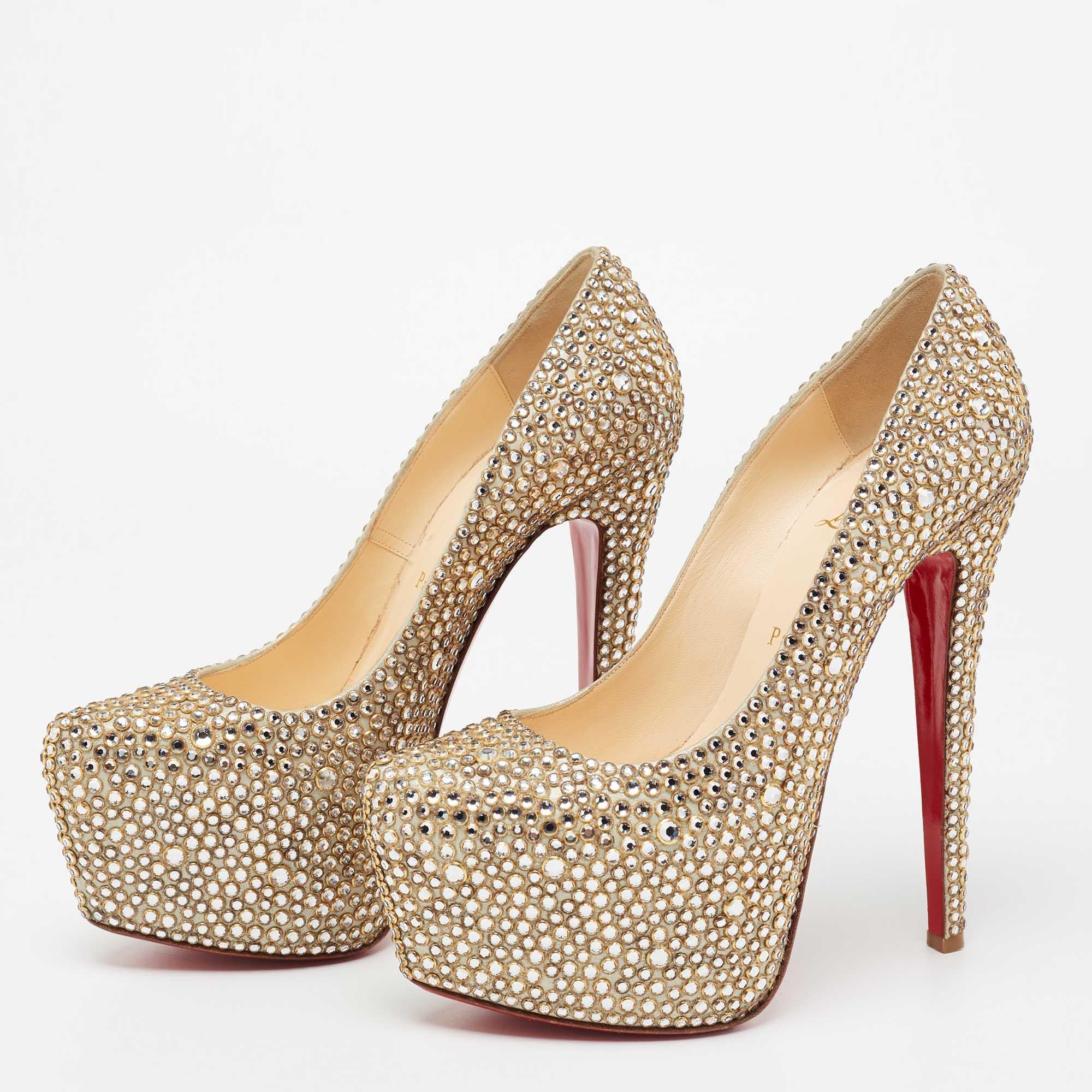Christian Louboutin's timeless aesthetic and impeccable craftsmanship in shoemaking is evident in these statement pumps. Made from leather in a metallic gold shade and covered with crystals, the sleek cuts will accentuate the curve of your feet.