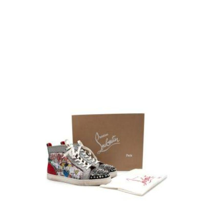 Christian Louboutin Crystal & Stud Embellished Louis Spike Trainers
 
 - Eyecatching all over crystal and stud embellished high top Louis trainers
 - Printed outer side with tonal diamantes, and black and silver studded toe cap
 - Metallic silver,