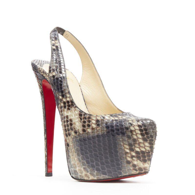 CHRISTIAN LOUBOUTIN Daffodile 160 brown scaled leather slingback platform EU38
Reference: TGAS/A04256
Brand: Christian Louboutin
Model: Daf Sling 160
Material: Leather
Color: Brown
Pattern: Animal Print
Made in: Italy

CONDITION:
Condition: