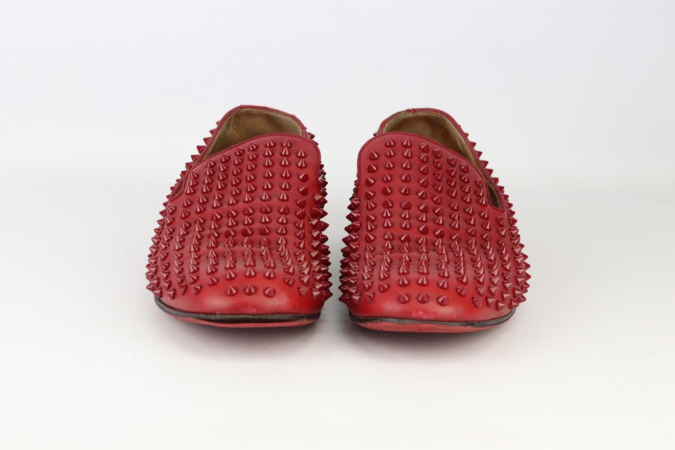Christian Louboutin Dandelion spiked leather loafers. Made from red matte leather with glossy spikes throughout and set on the brand’s iconic red sole. Red. Slip on. Does not come with box or dustbag. Size: EU 43.5 (UK 9.5, US 10.5). Insole: 11.2